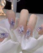 Press on Nails, Purity and charm of a fairy-like aura, wearing a combination of blue-tinted smoky aura butterfly and Camellia flowers on nails