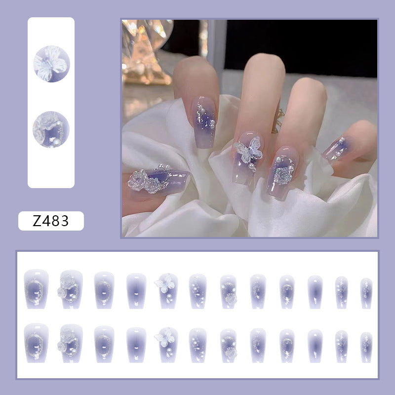 Press on Nails, Purity and charm of a fairy-like aura, wearing a combination of blue-tinted smoky aura butterfly and Camellia flowers on nails